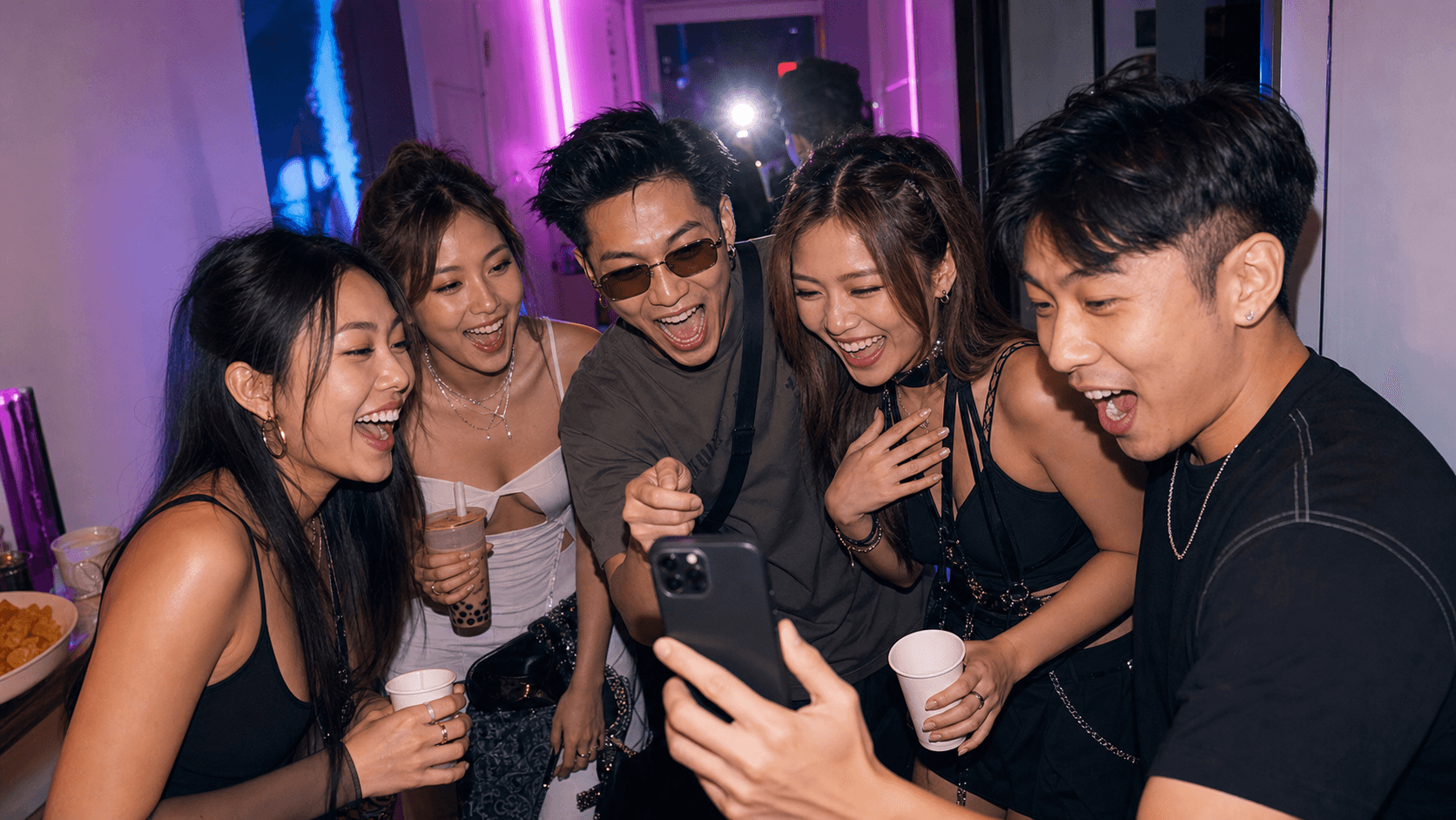 Friends reacting to a KANPAI prompt during a pre-game